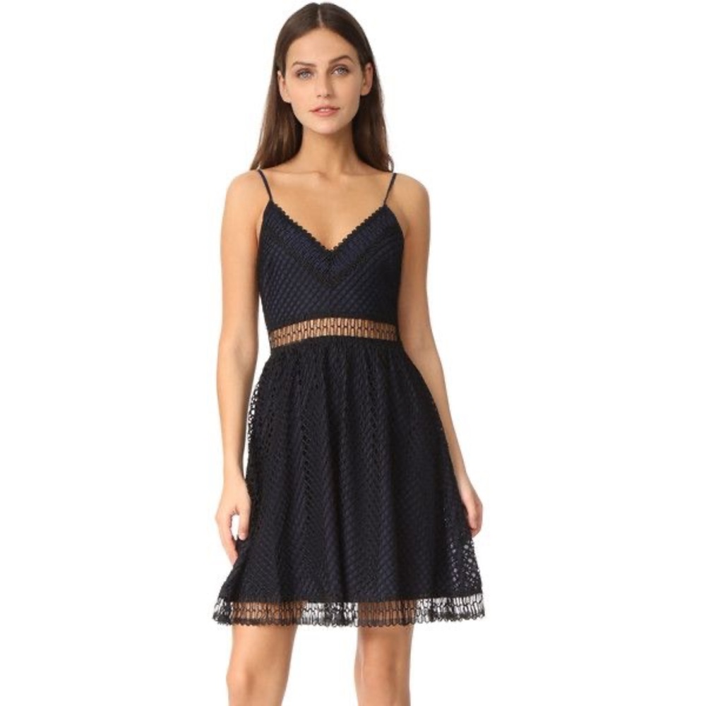 Likely navy blue dress